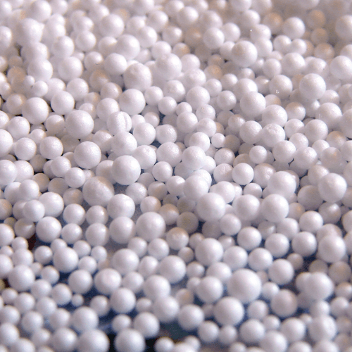EPS Beads on a Dark Surface.